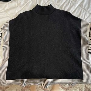 Never worn! Black and white turtleneck sweater with slits